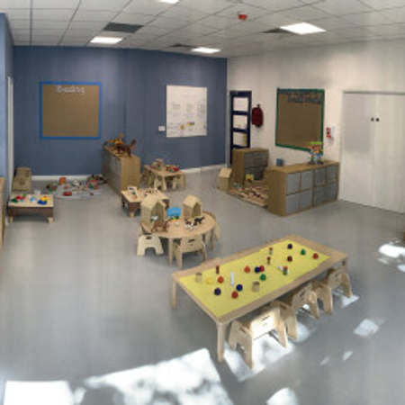 Nursery room with tables and chairs