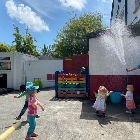 Nursery Outdoor playground with water hose