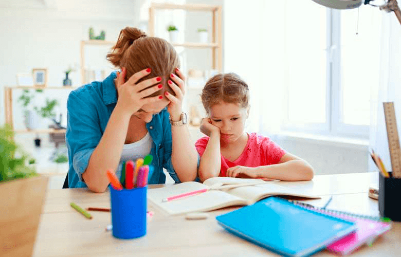 Mum with head in hands