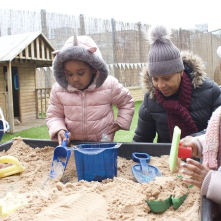 Nursery outdoor playground with beach sand and tools